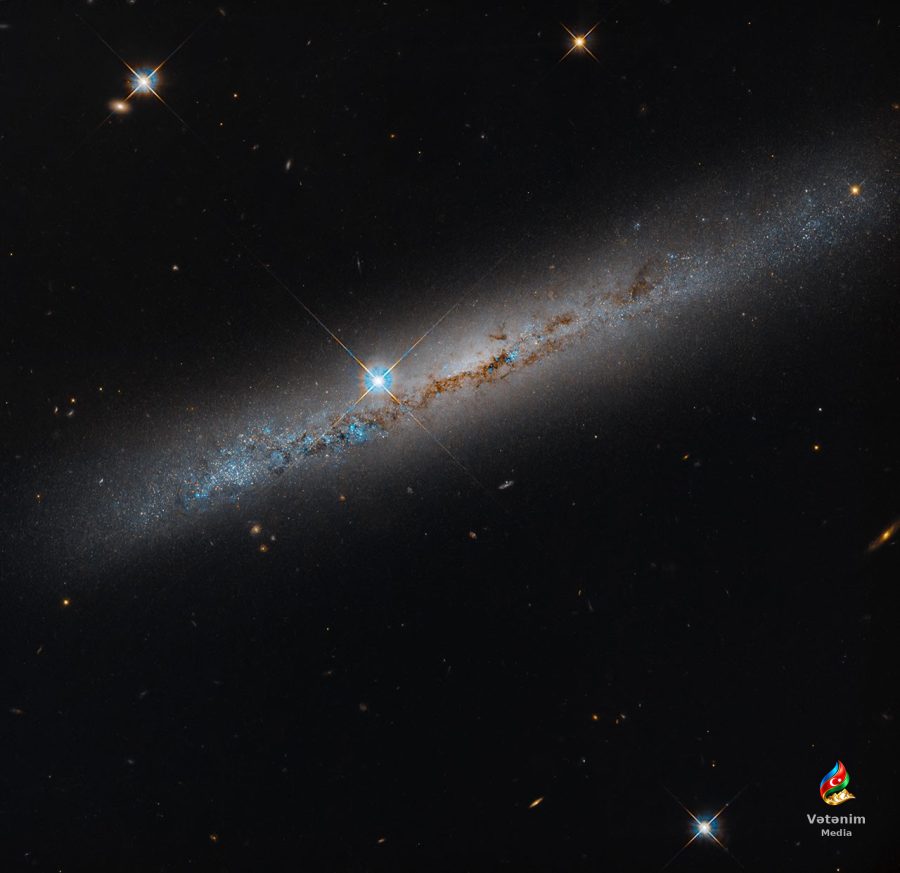 Hubble Süd Yolunun yaxınlığında yerləşən spiral qalaktikanı müşahidə edib